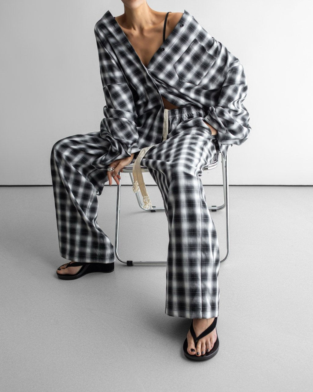 Everyday Over Check Shirt and matching pants worn seated