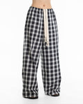 Everyday Oversized Plaid Check Wide Pants in black plaid — full length front view on model