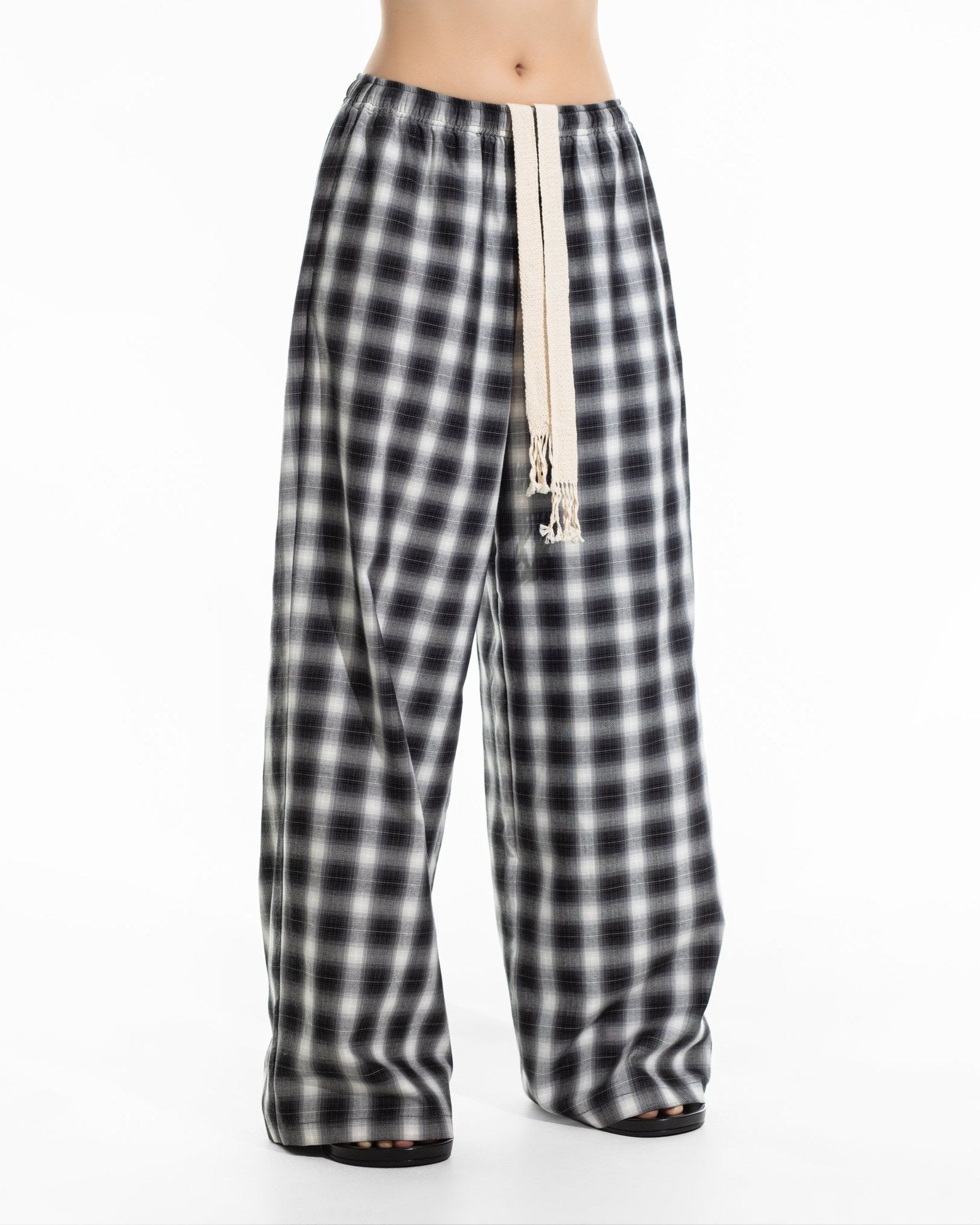 Everyday Oversized Plaid Check Wide Pants in black plaid — full length front view on model