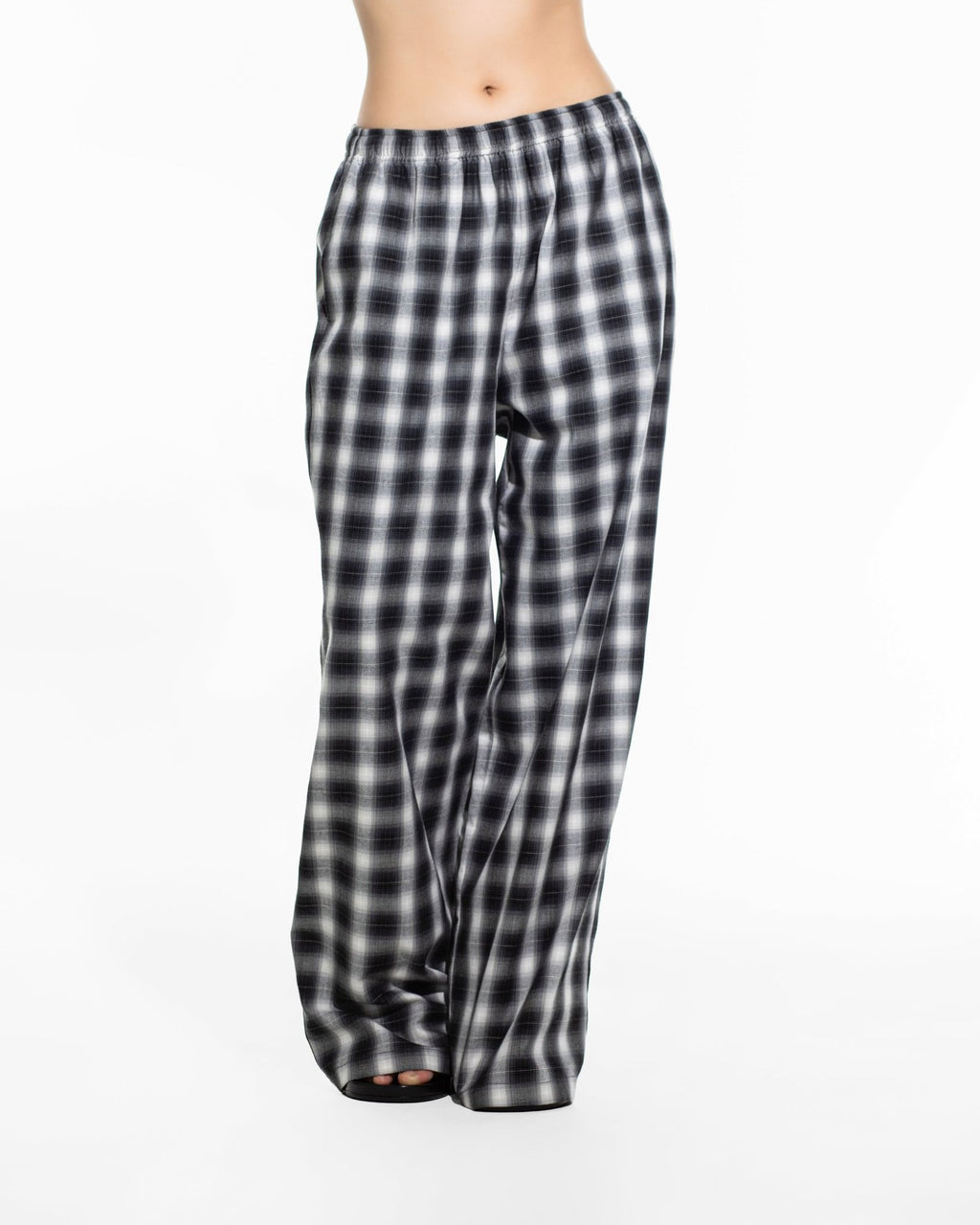 Oversized plaid check wide leg pants, angled view showing the full silhouette