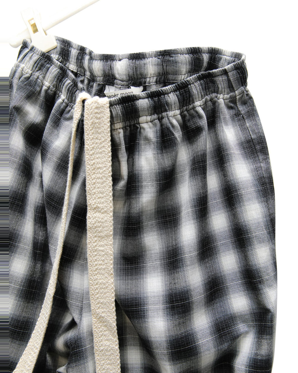 Detail of the woven cream drawcord and elasticated waist