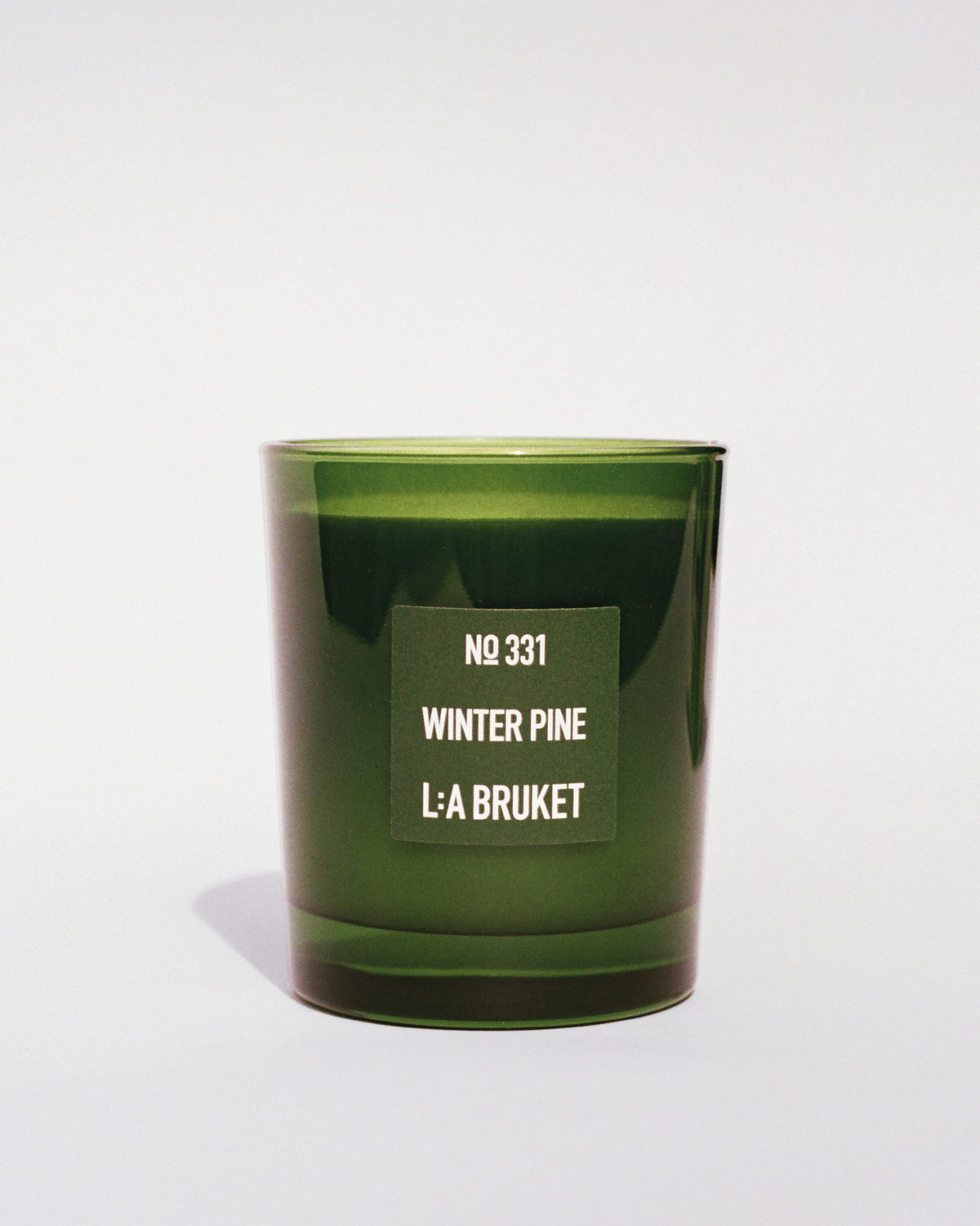 L:A BRUKET 331 Scented Candle Winter Pine 240g in deep green glass